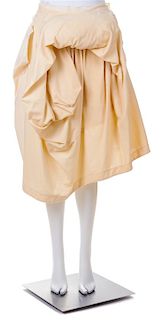 A Comme des Garcons Cream Cotton Skirt, Size small.