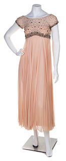 * A Malcolm Starr Pink Chiffon Evening Gown, No size.