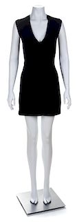 A Traina-Norell Black Wool Sleeveless Sweater Dress, No size.