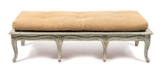 A Swedish Provincial Painted Bench Height 18 x width 59 x depth 28 inches.