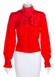 An Yves Saint Laurent Red Silk Blouse, Size 38.