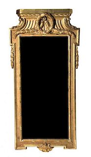 A Neoclassical Style Giltwood Pier Mirror Height 72 x width 31 1/2 inches.