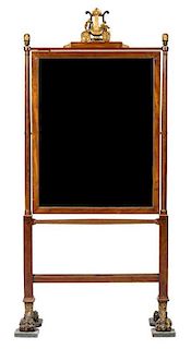A Danish Neoclassical Parcel Gilt Mahogany Cheval Mirror Height 79 x width 38 1/2 x depth 18 inches.