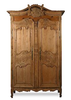 A Louis XV Provincial Pine Armoire Height 92 x width 51 1/2 x depth 24 inches.