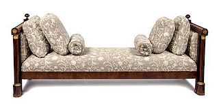 An Empire Style Gilt Metal Mounted Mahogany Daybed Height 39 1/2 x width 98 1/2 x depth 33 inches.