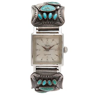 A Navajo Silver and Turquiose Watch Band 