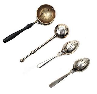 A Group of Four Silver-Plate Tea Strainers. Length of largest 7 inches.