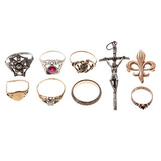 A Collection of Vintage Rings and Pendants