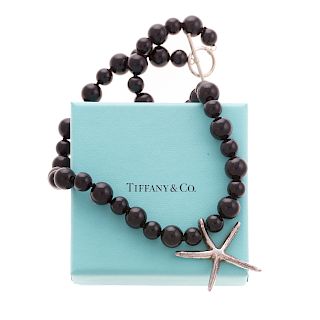 A Tiffany & Co. Onyx Starfish Necklace by Peretti