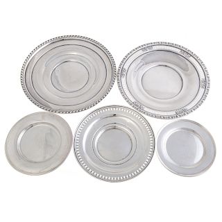 A collection of sterling silver plates