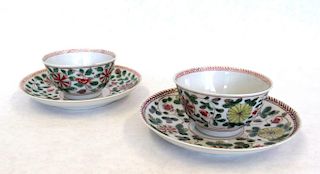 Pair of Famille Verte Cups and Saucers.