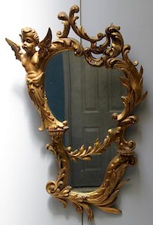 Antique Carved and Giltwood Mirror With Angel