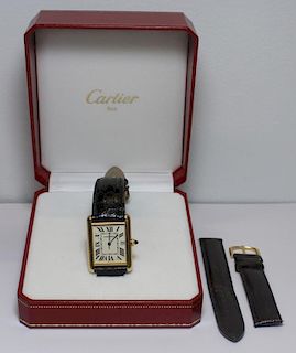 JEWELRY. Men's Cartier 18kt Gold Tank Watch.