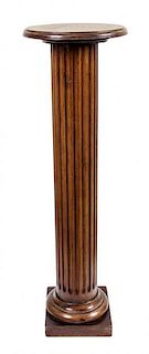 An Edwardian Mahogany Pedestal, Height 39 x diameter 12 inches.