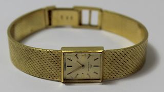 JEWELRY. Ladies Movado 18kt Gold Wrist Watch.