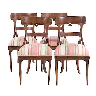 Four German Biedermeier walnut dining chairs
