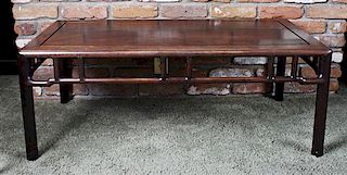 A Chinese Wood Low Table, Height 16 1/4 x width 42 x depth 20 1/4 inches.