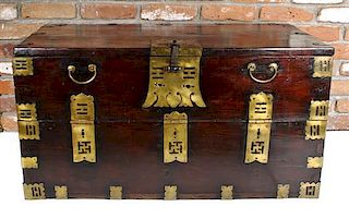 A Korean Iron and Brass Mounted Hardwood Chest, Height 19 x width 35 1/4 x depth 17 inches.