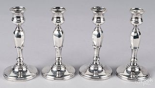 Set of four Birmingham silver candlesticks