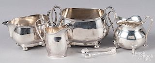 Two sets of English silver sugar and creamers, et