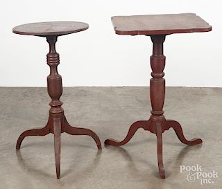 Two red painted candlestands