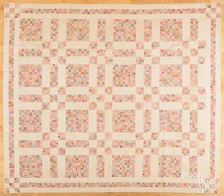 Pieced postage stamp block quilt