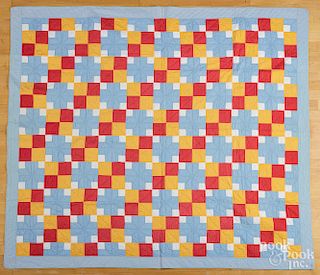 Pieced cross and block quilt