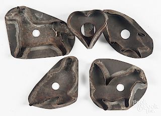 Five tinned iron cookie cutters