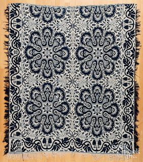 Blue and white jacquard coverlet
