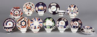 Twelve Gaudy Welsh cups and saucers