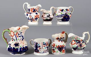 Six Gaudy Welsh cream pitchers