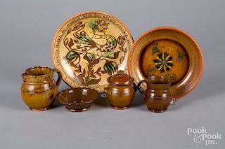 Six pieces of Stahl redware.