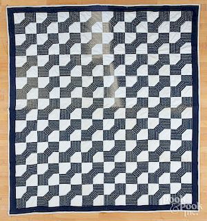 Two contemporary pieced quilts.