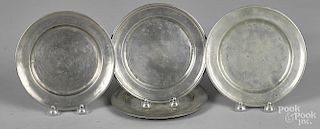 Four American pewter plates