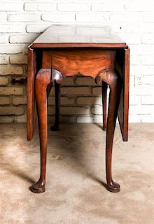 A Queen Anne Mahogany Drop-Leaf Table, Height 27 1/4 x width 42 1/2 x depth 16 1/2 inches (closed).