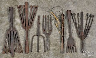 Collection of wrought iron eel spears