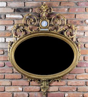 A Victorian Adam Style Jasperware Mounted and Gilt Lacquered Mirror, Height 45 1/2 x width 35 1/2 inches.