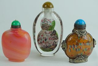 Three Chinese Cabochon Top Snuff Bottles