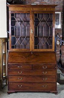 A George III Mahogany and Satinwood Marquetry Inlaid Secretary Bookcase, Height 87 x width 47 1/2 x depth 21 1/2 inches.