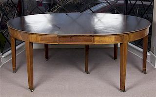 A George III Style Mahogany Dining Table, Height 28 3/4 x width 73 1/4 x depth 59 inches.