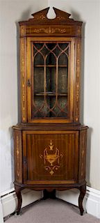 An English Marquetry Inlaid Mahogany Corner Cupboard, Height 74 1/2 x width 27 1/2 x depth 15 1/2 inches.