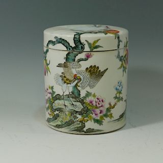 FAMILLE ROSE LIDDED JAR PAINTED W/ CRANES AND PINE TREES. JIAPING MARK.