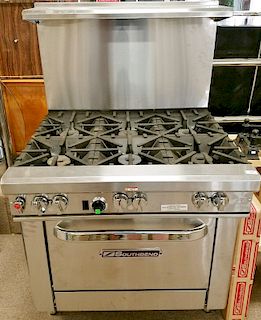 Southbend stainless steel commercial grade stove and oven. ht. 59in., wd. 36 1/2in., dp. 34in.