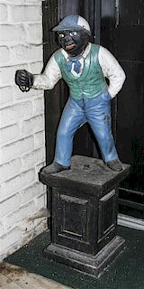 A Cast Iron Lawn Jockey, Height 38 inches.