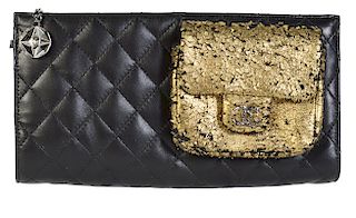 Unique CHANEL Black Quilted Lambskin Clutch