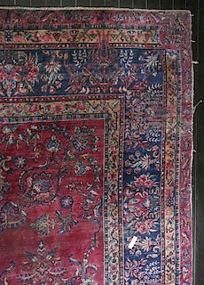 A Sarouk Wool Carpet, 17 feet x 6 inches x 10 feet.