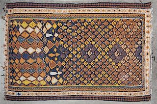 A Caucasian Wool Rug. Approximately 6 feet x 4 feet 3 inches.