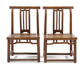 * A Pair of Chinese Jumu Side Chairs, Kaobeiyi Each height 33 1/4 x width 19 3/4 x depth 15 1/2 inches.