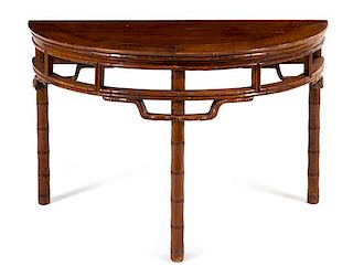 * A Chinese Hardwood 'Bamboo-Motif' Demi-Lune Console Table, Banyuezhuo Height 31 1/2 x width 49 3/4 x depth 24 1/2 inches.
