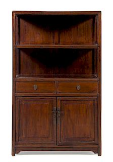 * A Chinese Hongmu Display Cabinet Lianggegui Height 64 x width 39 3/4 x depth 15 1/4 inches.